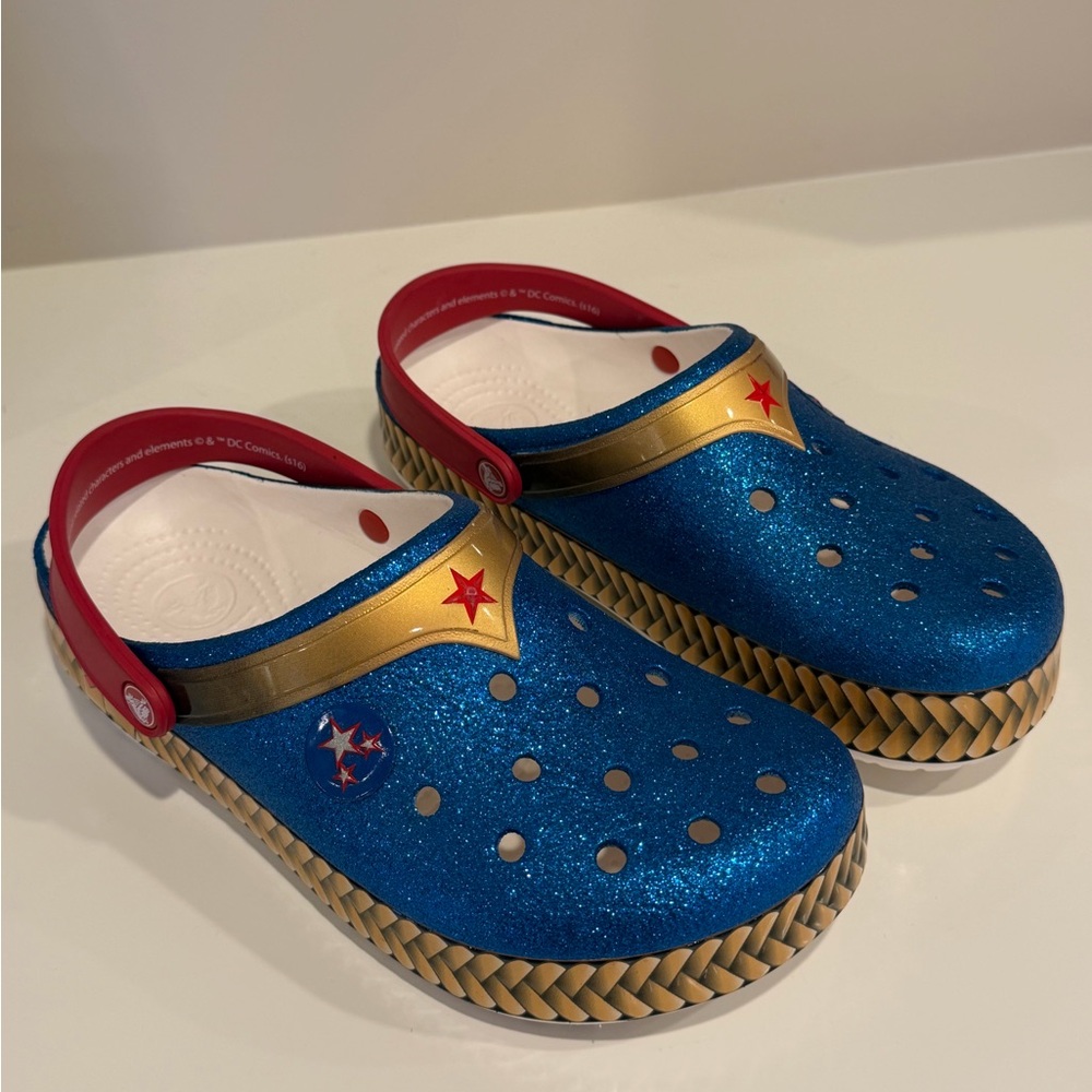 CROCS Glitter Wonder Woman Blue Clog with Gold Trim & Red Accents
